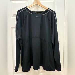 Athletic material black with grey stitching long sleeve with thumb holes.